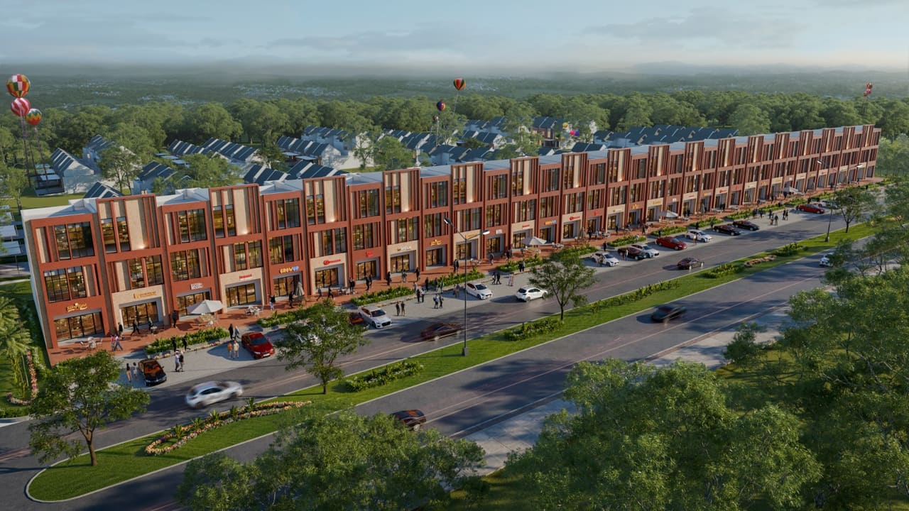 Render udara Ruko Americano memanjang di sepanjang koridor komersial boulevard Metland Menteng dengan kawasan hunian di belakangnya